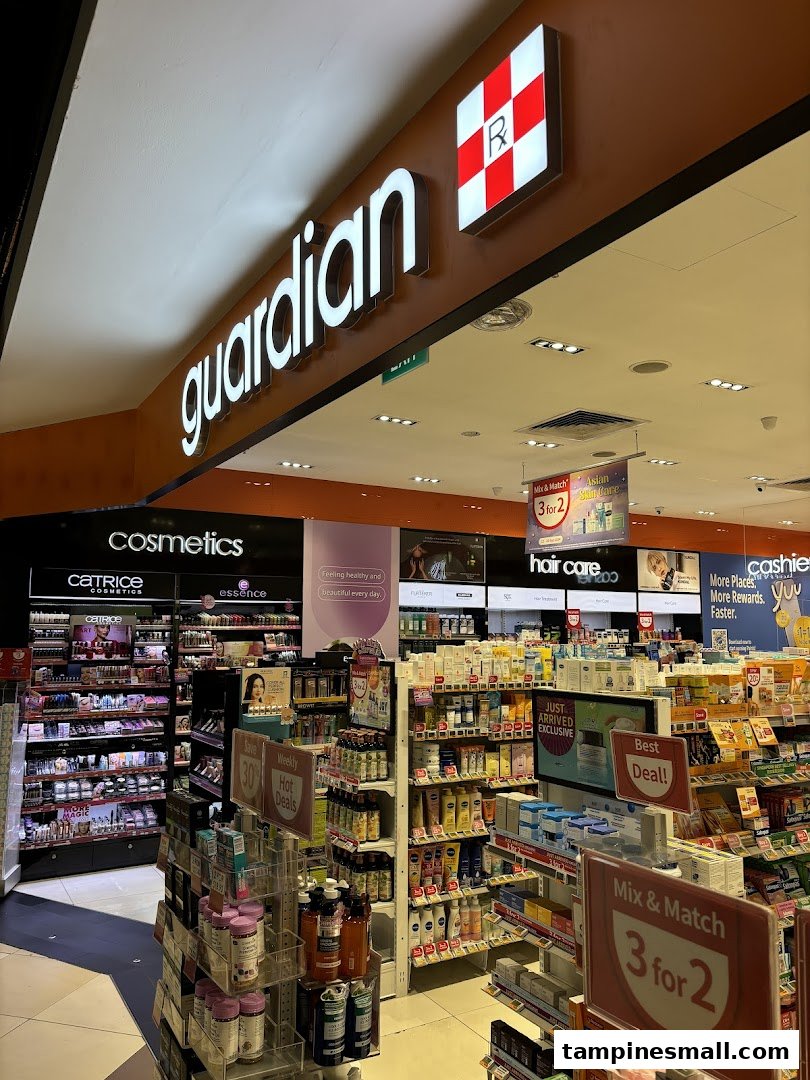 An interior view of Guardian Health & Beauty, showcasing cosmetics, hair care, and various health products with promotional signage.