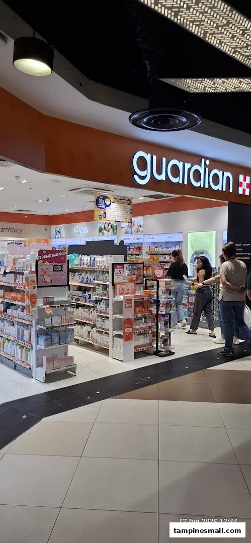 The entrance of Guardian Health & Beauty store, showcasing various health and beauty products.