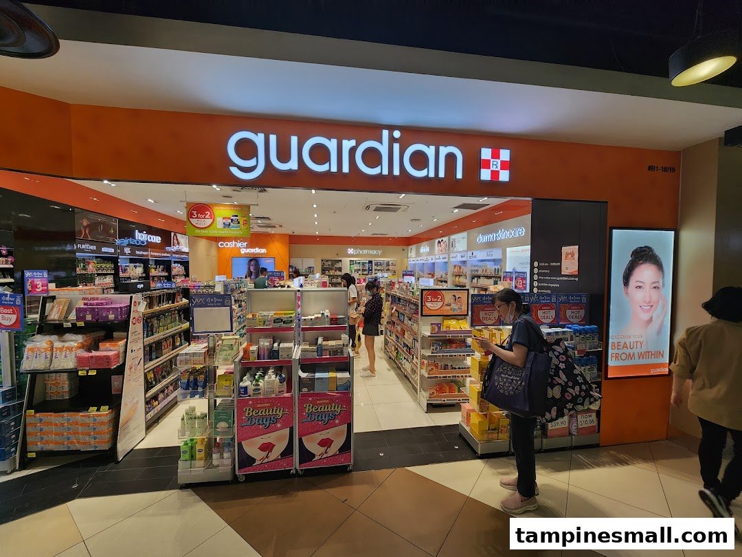 Exterior view of Guardian Health & Beauty store entrance with products and customers.
