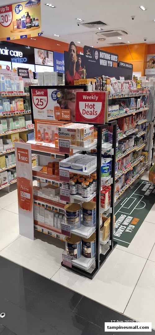 An aisle inside Guardian Health & Beauty, showcasing health, beauty products, and weekly hot deals.