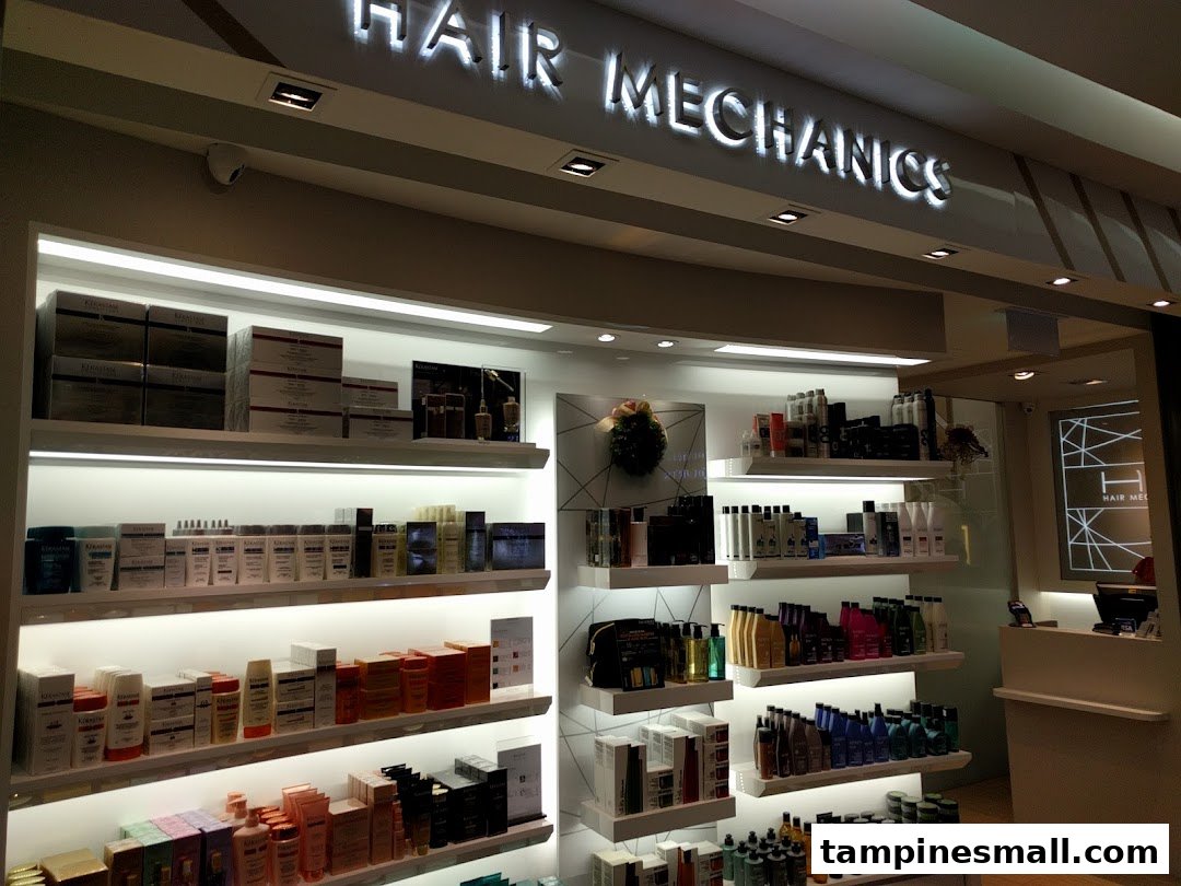 Interior view of Hair Mechanics showcasing a wide array of hair care products on brightly lit shelves.