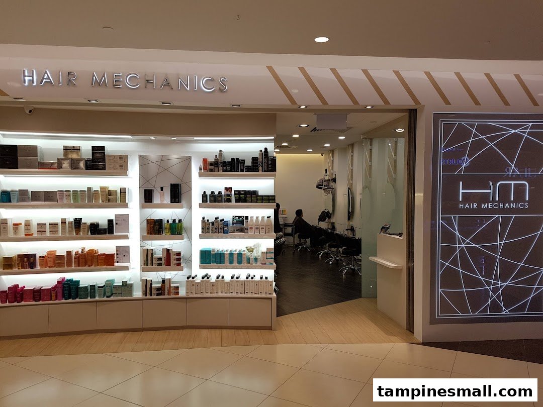 The brightly lit entrance of Hair Mechanics salon, showcasing product displays and a glimpse inside.
