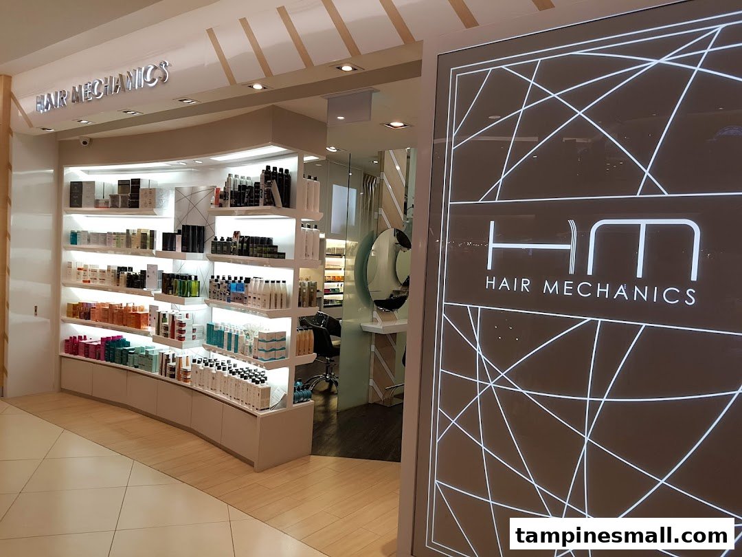 The brightly lit entrance and product display of the Hair Mechanics salon.