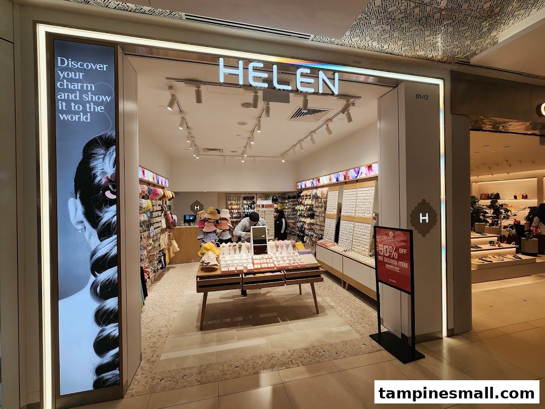The brightly lit entrance of Helen, an accessories shop, showcasing various jewelry and hair accessories.
