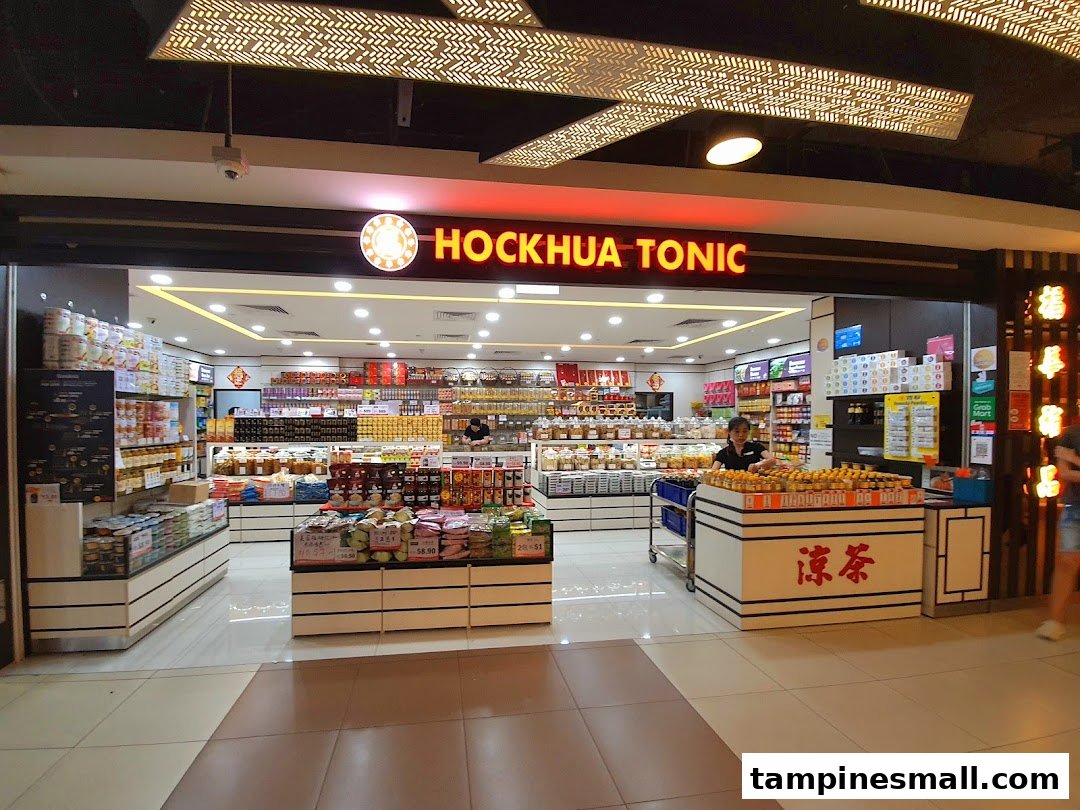 Brightly lit shop front of Hockhua Tonic, showcasing a wide array of traditional health products and tonics.