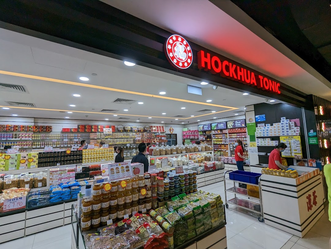 Brightly lit interior of Hockhua Tonic, showcasing a wide array of traditional health products and tonics.