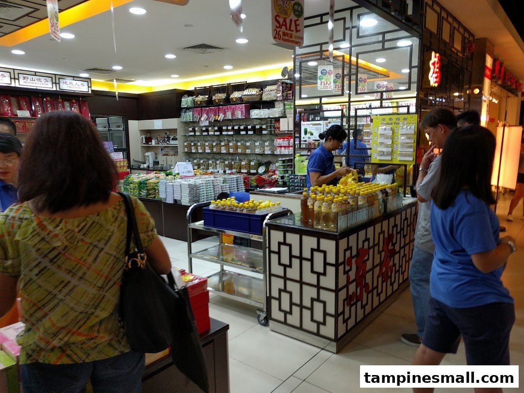 Customers browse traditional Chinese tonics and health products inside Hockhua Tonic shop.