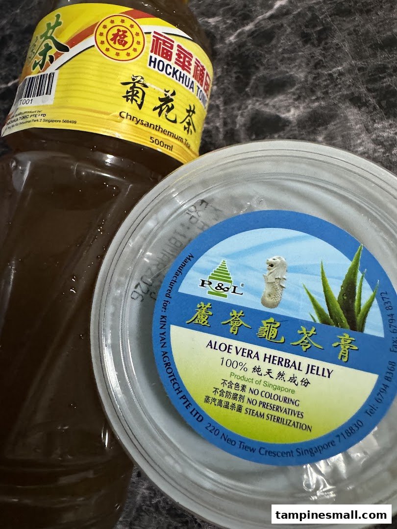 A bottle of Hockhua Tonic Chrysanthemum Tea and a container of P&L Aloe Vera Herbal Jelly.