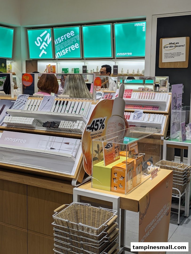 Interior view of Innisfree showcasing skincare product displays, promotions, and brand signage.