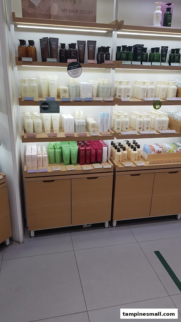 Innisfree shelves displaying a wide array of natural hair and body care products.