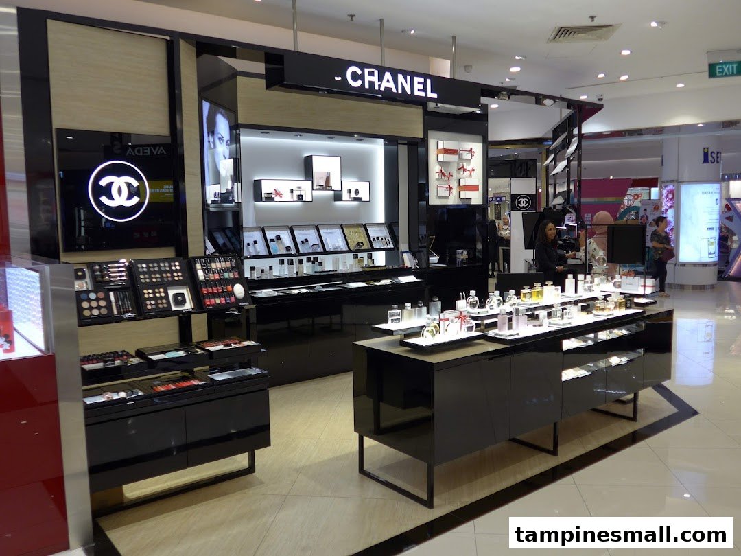 A luxurious Chanel beauty counter inside Isetan Singapore, showcasing cosmetics and fragrances.