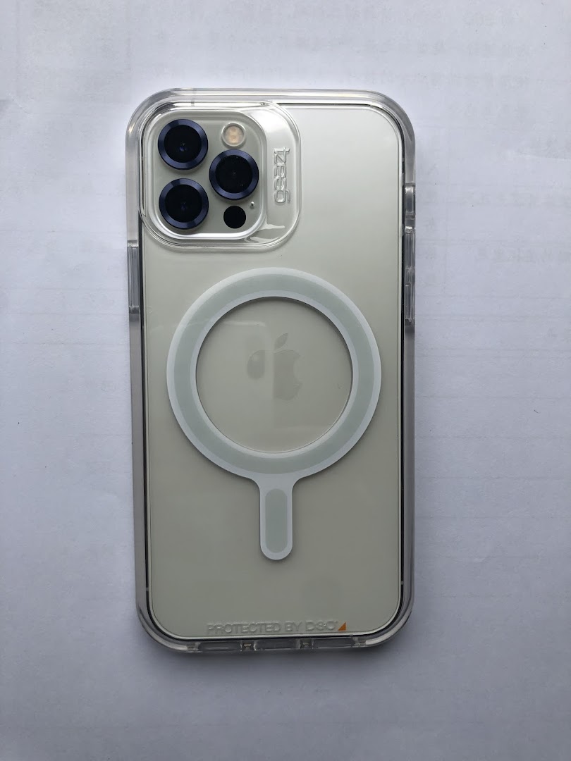 An iPhone 15 Pro Max in a clear protective case with a visible MagSafe ring.