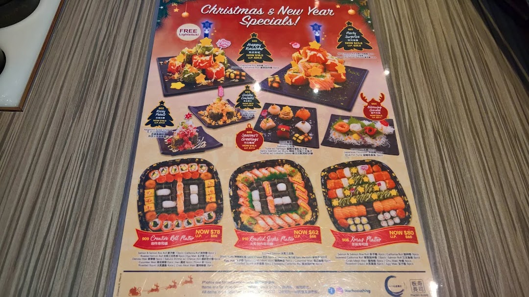 A menu displaying Itacho Sushi's Christmas & New Year sushi specials and platters.