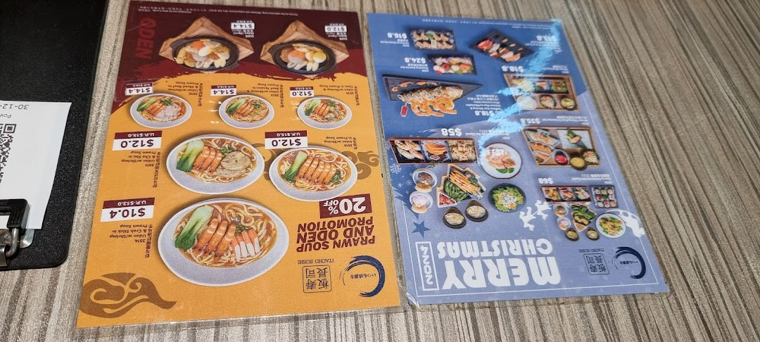 Two menu pages from Itacho Sushi, showcasing prawn soup udon, oden, and Christmas sushi specials.