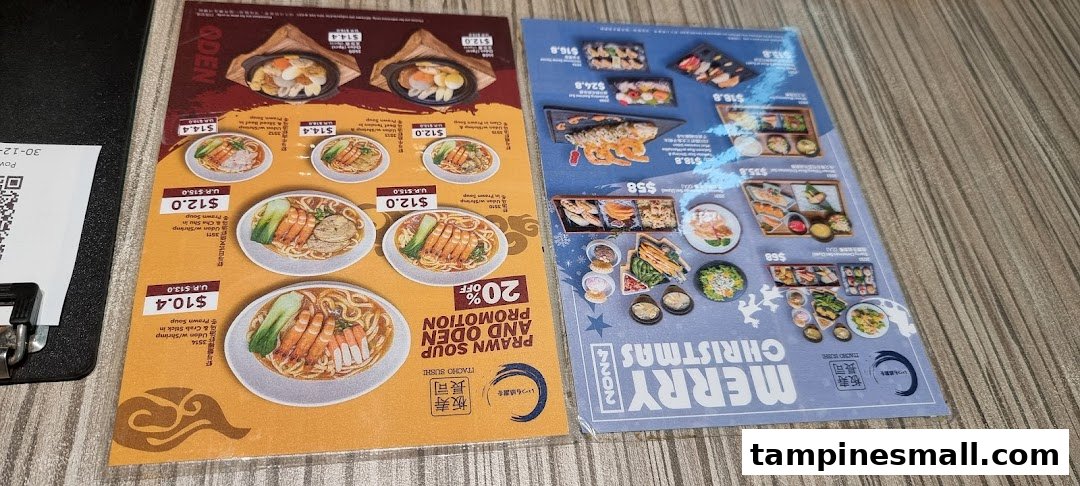 Two menu pages from Itacho Sushi, showcasing prawn soup udon, oden, and Christmas sushi specials.