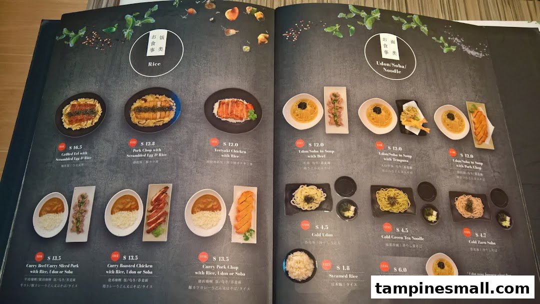 A two-page Japanese restaurant menu displaying various rice, udon, and soba dishes with prices.