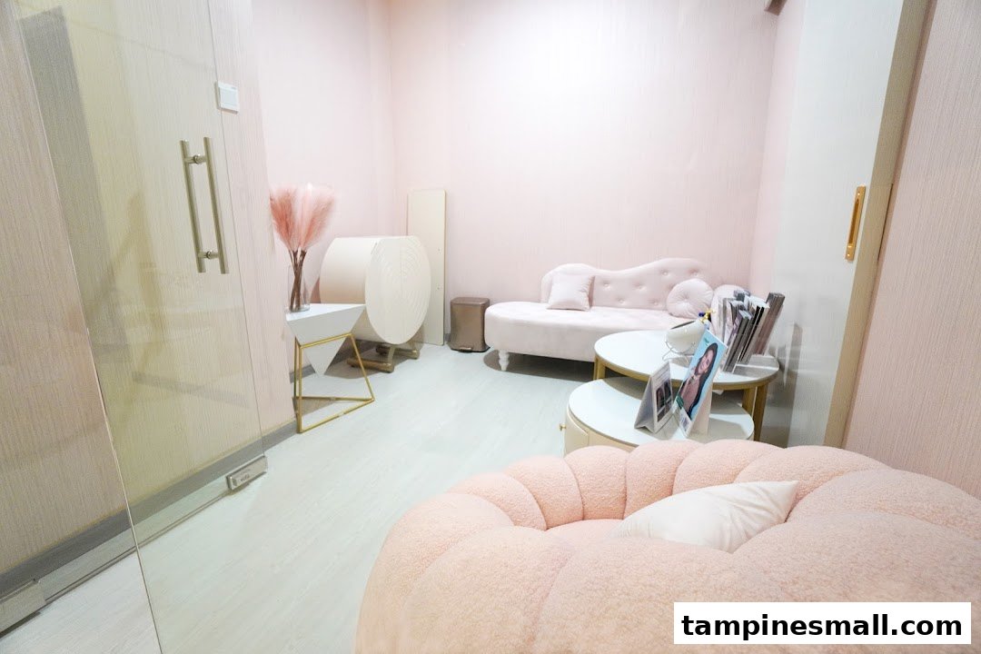 A cozy, pink-themed waiting area with plush seating and modern decor at IVI Medical Clinic.