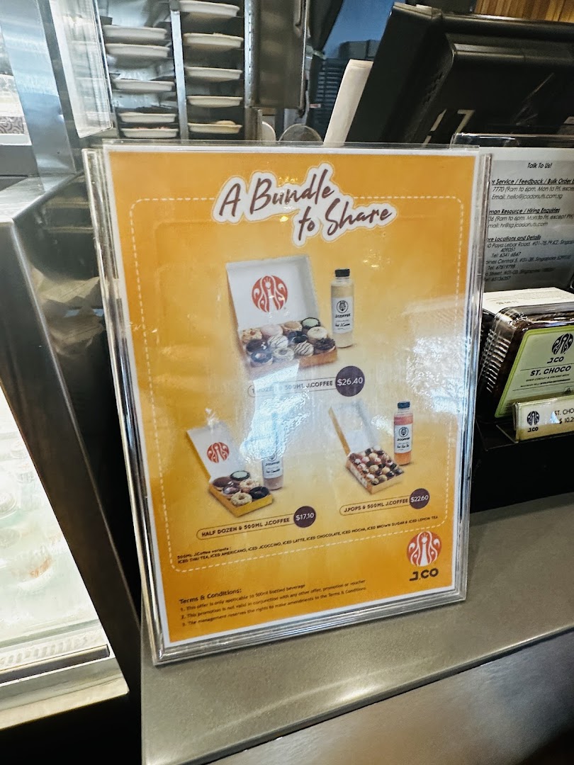 A promotional poster displaying J.Co Donuts & Coffee bundle deals with various donut and coffee combinations.