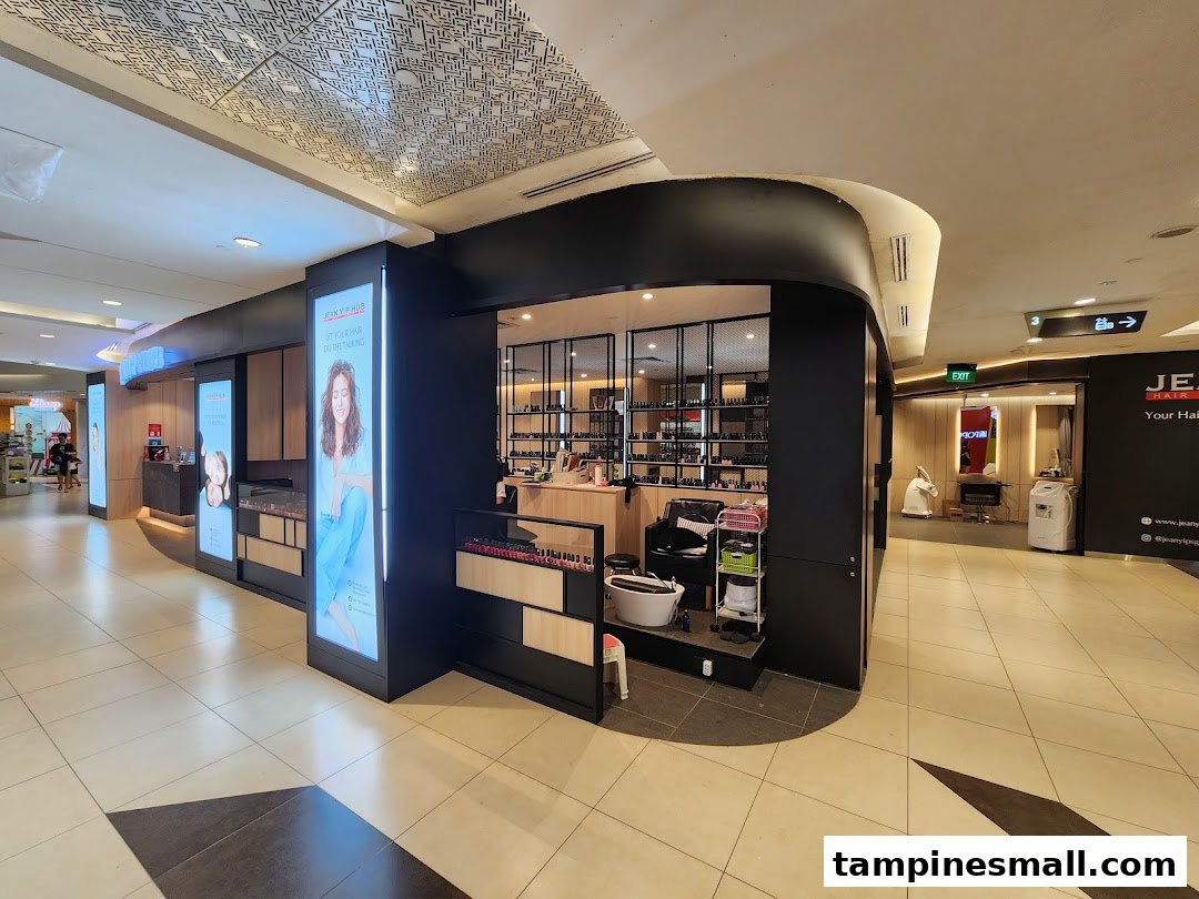 The modern shopfront of Jean Yip Hairdressing and Beauty, showcasing its services and inviting entrance.