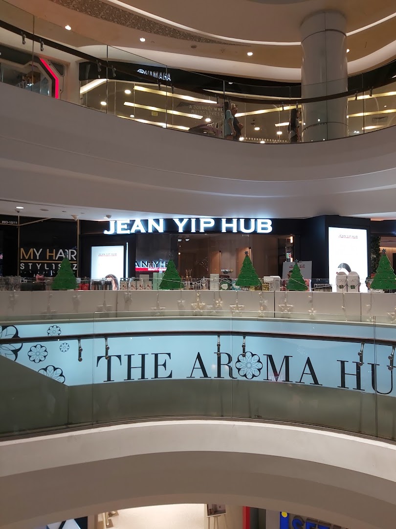 View of Jean Yip Hub's entrance and prominent signage within a multi-level shopping mall.