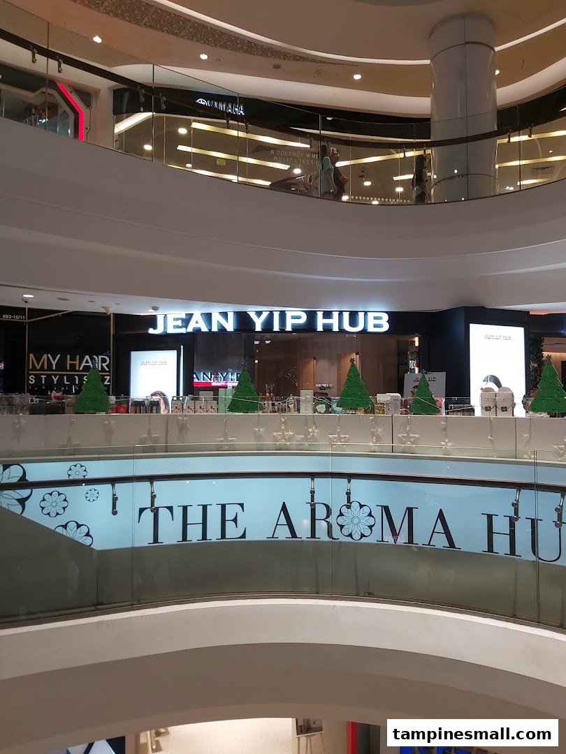 View of Jean Yip Hub's entrance and prominent signage within a multi-level shopping mall.