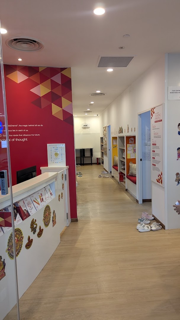 Interior view of Julia Gabriel Centre showing the reception desk, hallway, and learning spaces.