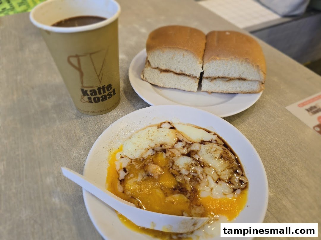 A classic Singaporean breakfast set with coffee, kaya toast, and soft-boiled eggs from Kaffe Toast.