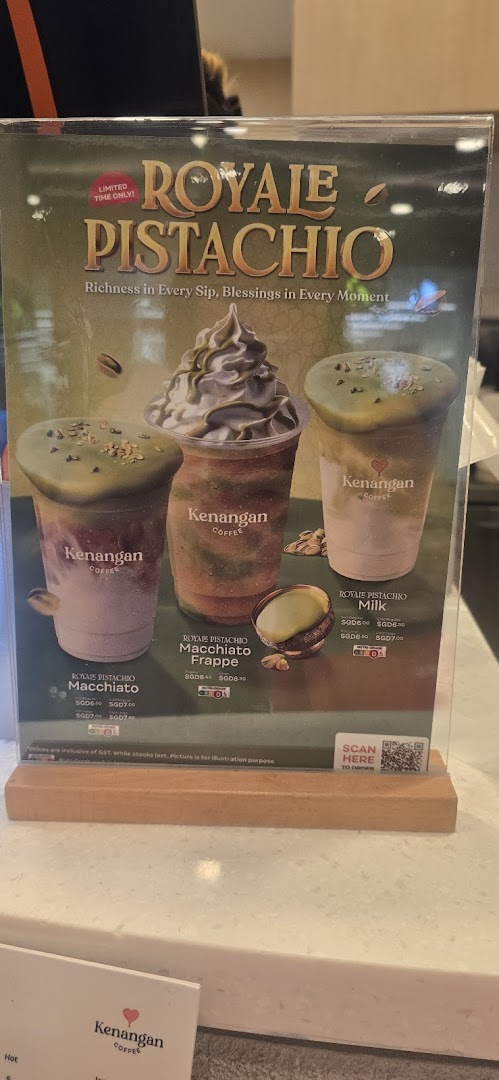 A promotional display board showcasing Kenangan Coffee's limited-time Royale Pistachio drink series.