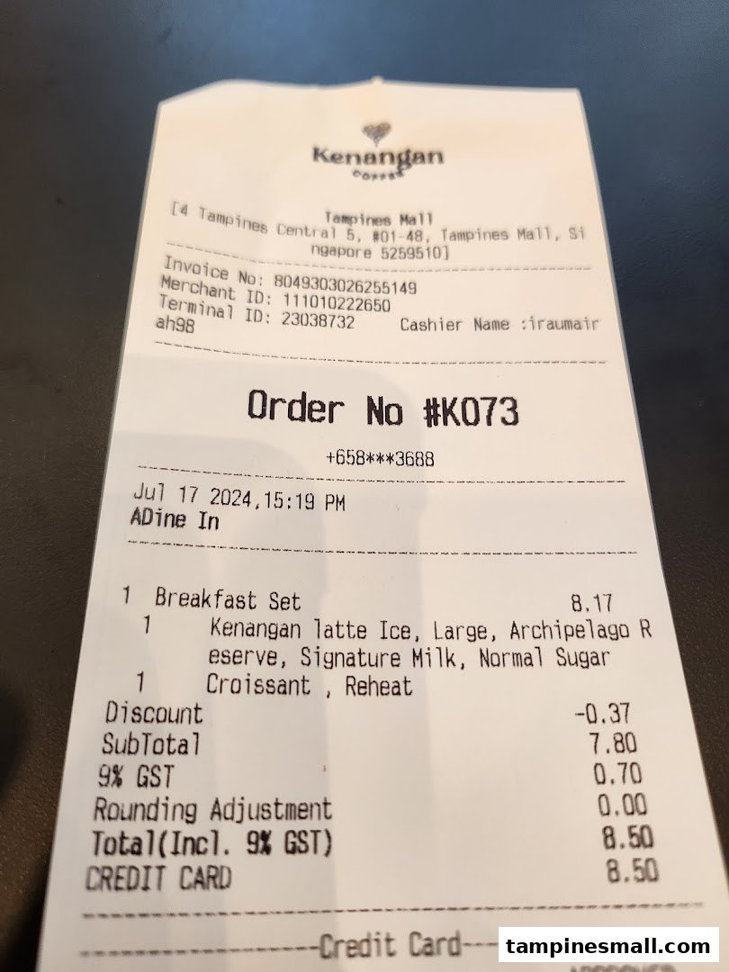A receipt from Kenangan Coffee showing a breakfast set order with Kenangan Latte Ice and Croissant.