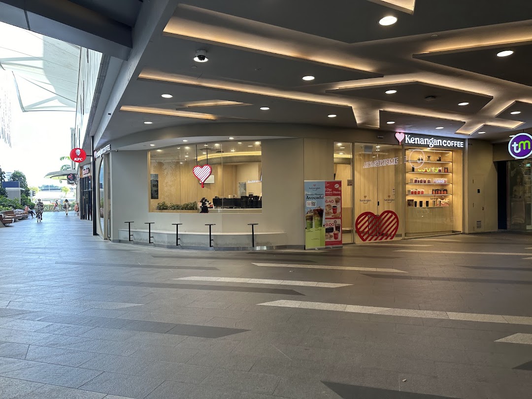 Exterior view of Kenangan Coffee at Tampines Mall, showcasing its inviting entrance and branding.