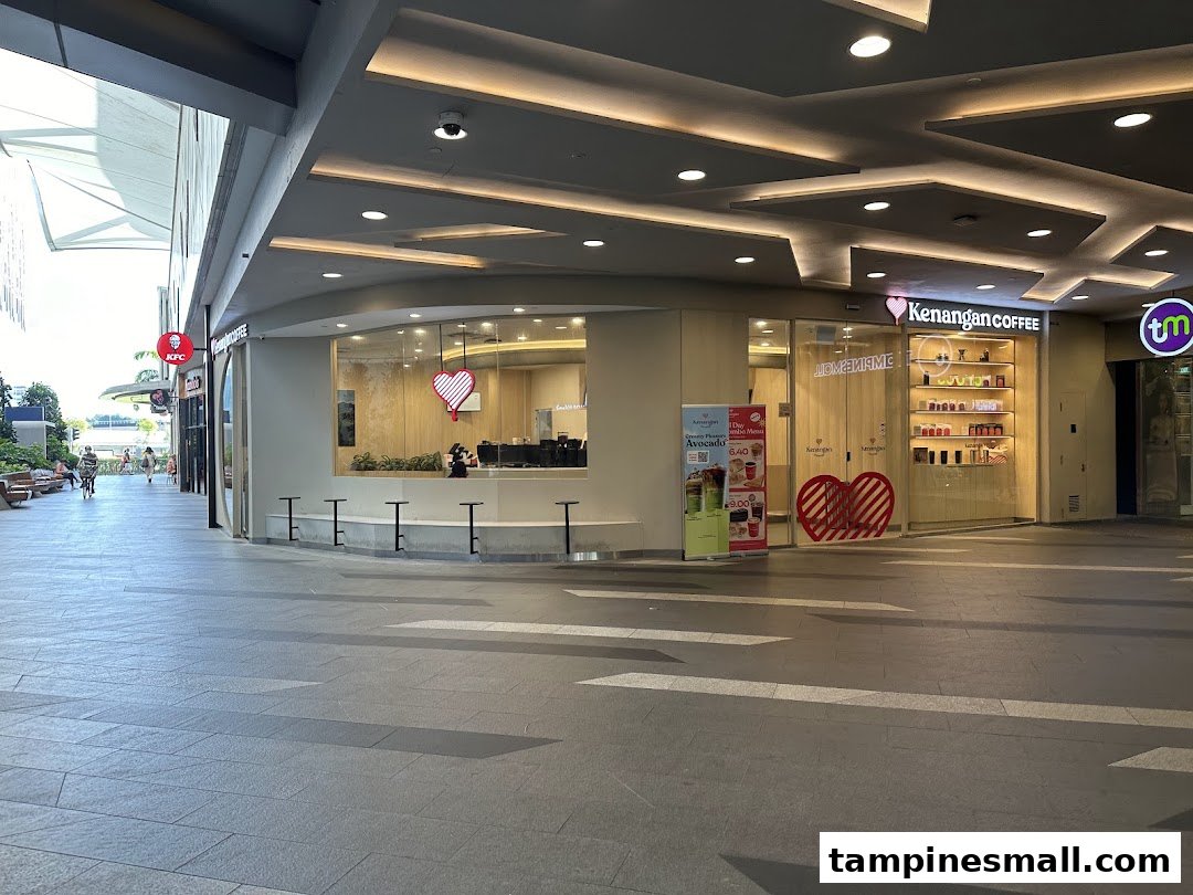 Exterior view of Kenangan Coffee at Tampines Mall, showcasing its inviting entrance and branding.