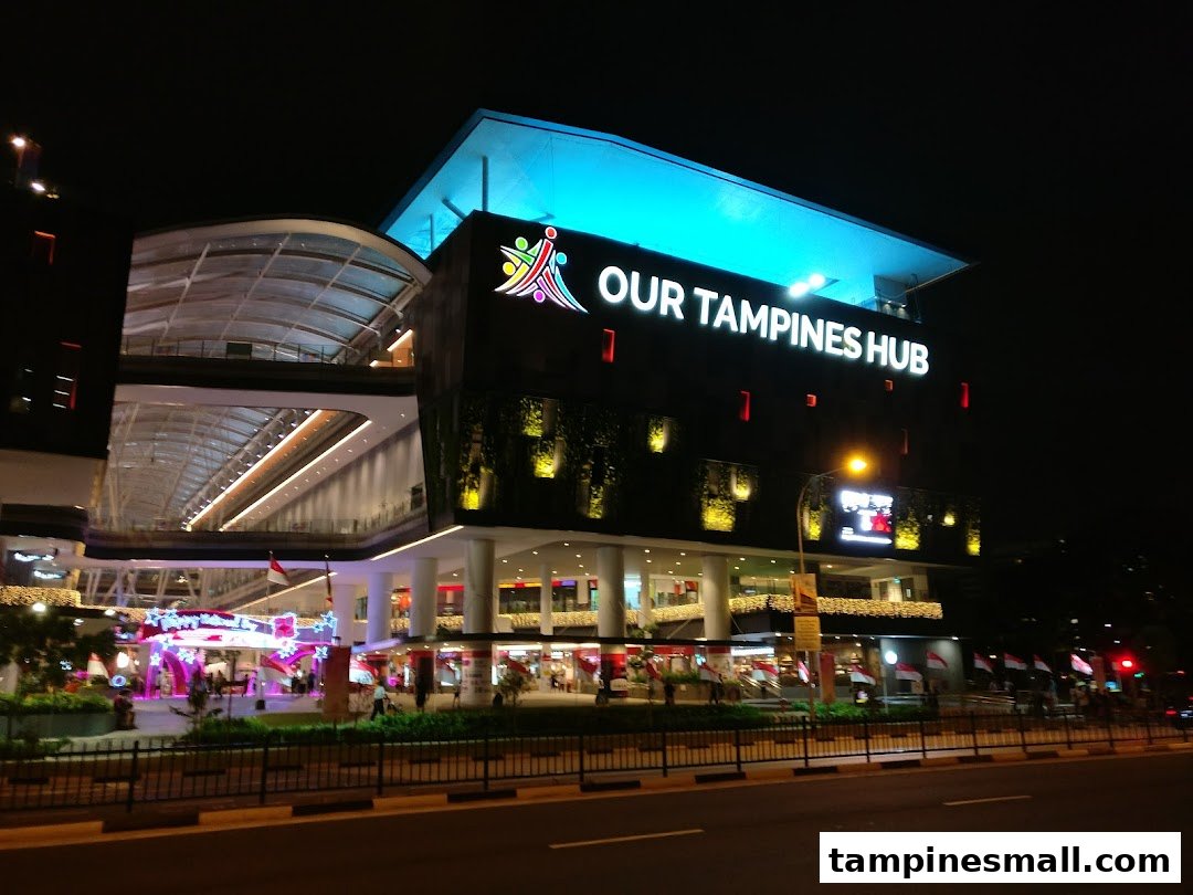 Our Tampines Hub illuminated at night, a vibrant community and lifestyle destination.