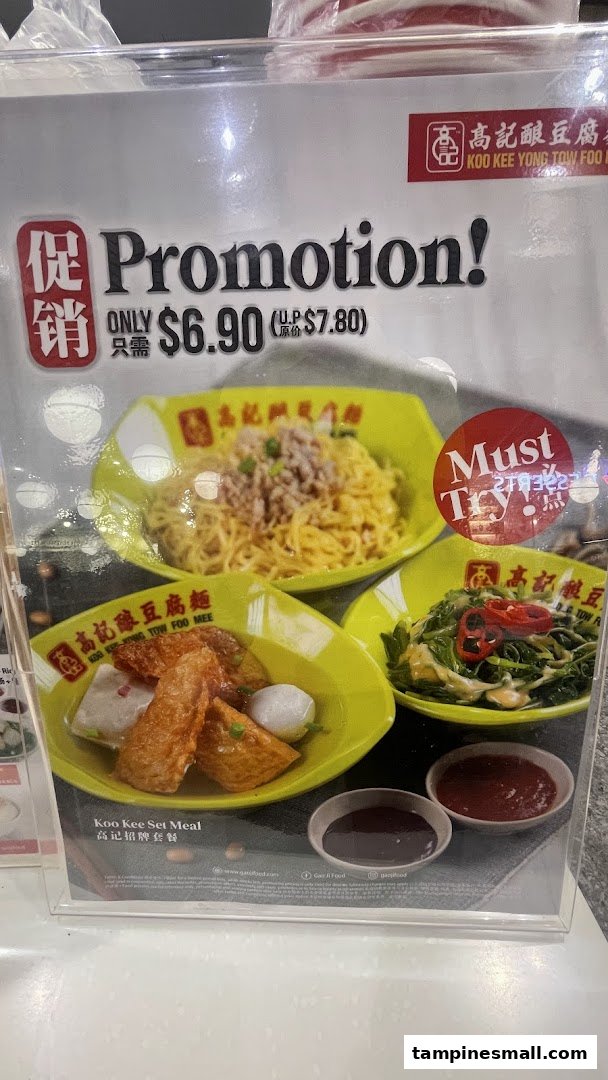 A promotional display for Koo Kee Yong Tow Foo Mee's set meal, featuring noodles, yong tow foo, and vegetables.
