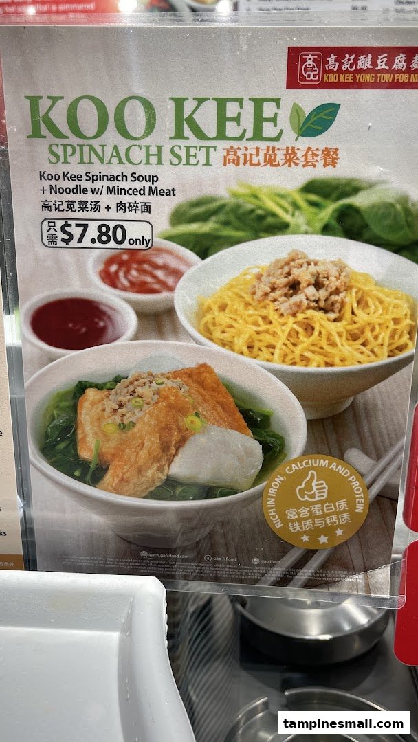 A menu board displaying the Koo Kee Spinach Set with soup, noodles, and Yong Tow Foo.