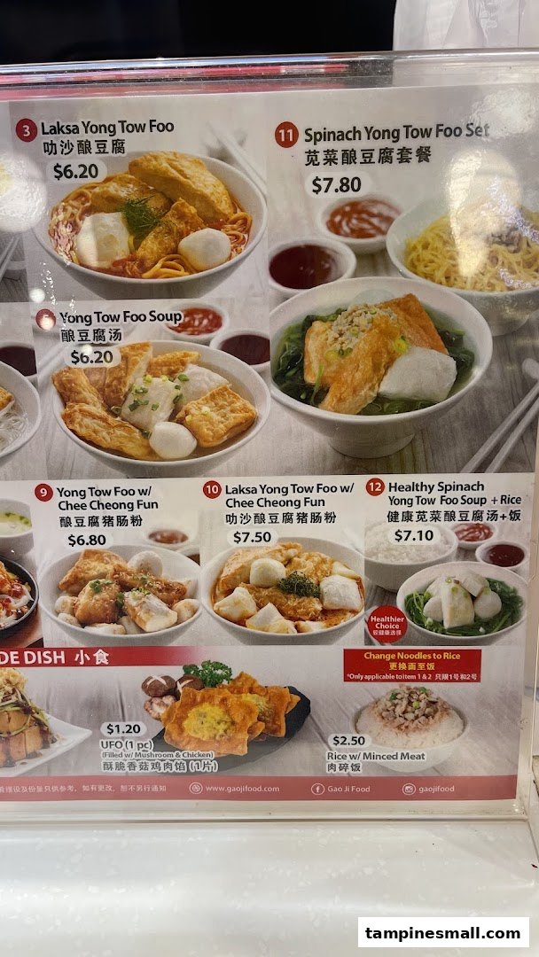 A vibrant menu display showcasing various Yong Tow Foo dishes with prices and images.