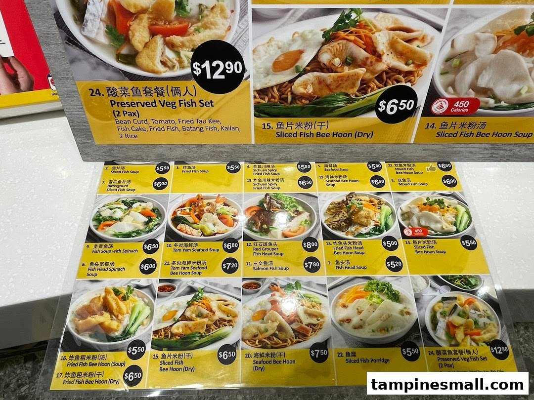 A detailed menu display for Kopitiam, showcasing a variety of fish and seafood dishes with prices and descriptions.