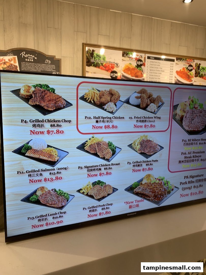 A digital menu board displaying a variety of Western-style main courses with images and promotional prices.