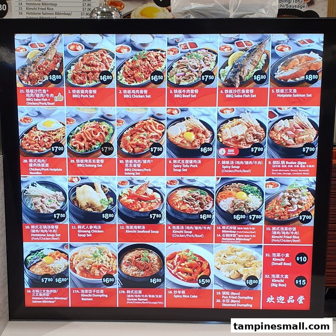 A vibrant digital menu board showcasing a variety of Korean dishes with appetizing photos and prices.