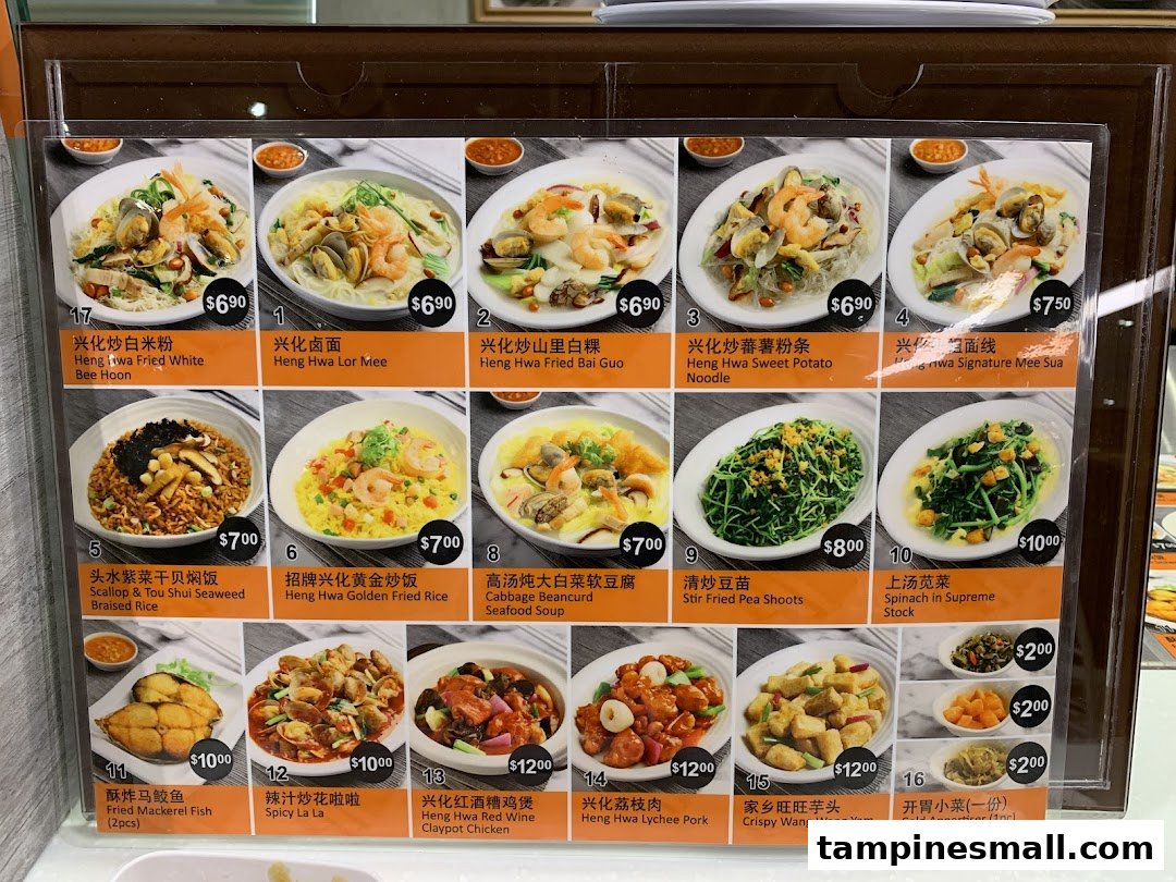 A vibrant menu display showcasing various Heng Hwa cuisine dishes with photos and prices at Kopitiam.