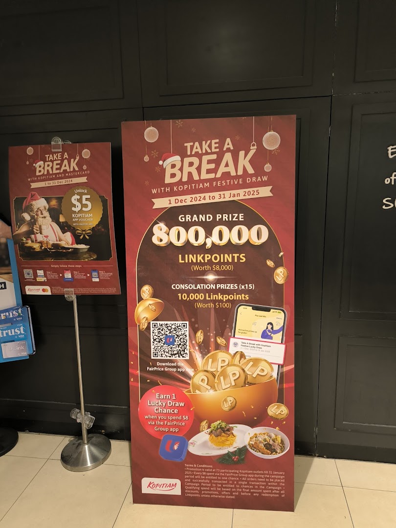 Two promotional banners for Kopitiam's festive draw and a Mastercard voucher offer, featuring Santa and Linkpoints.