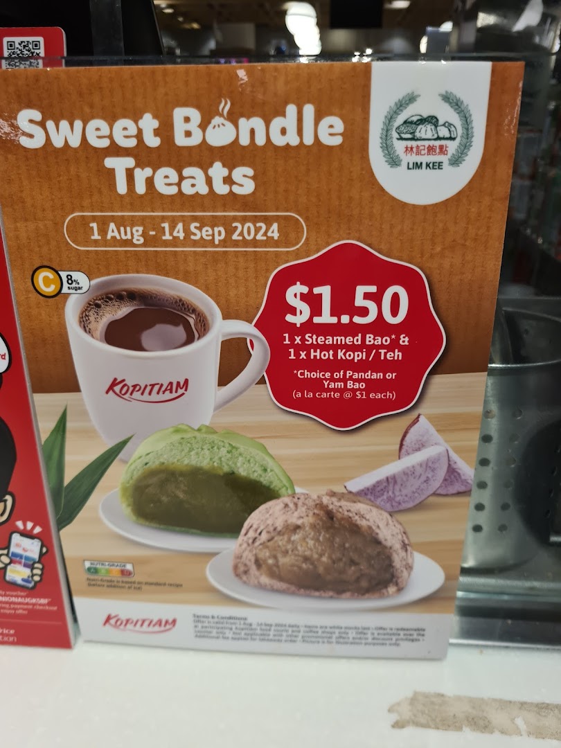 A promotional poster for Kopitiam's 'Sweet Bundle Treats' featuring a hot drink and two types of bao.