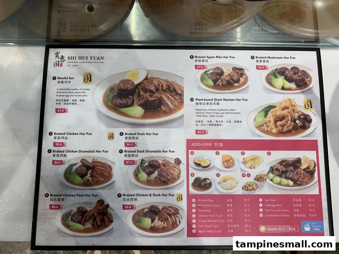 A detailed menu board for Shi Hui Yuan, featuring various braised hor fun dishes and add-ons.