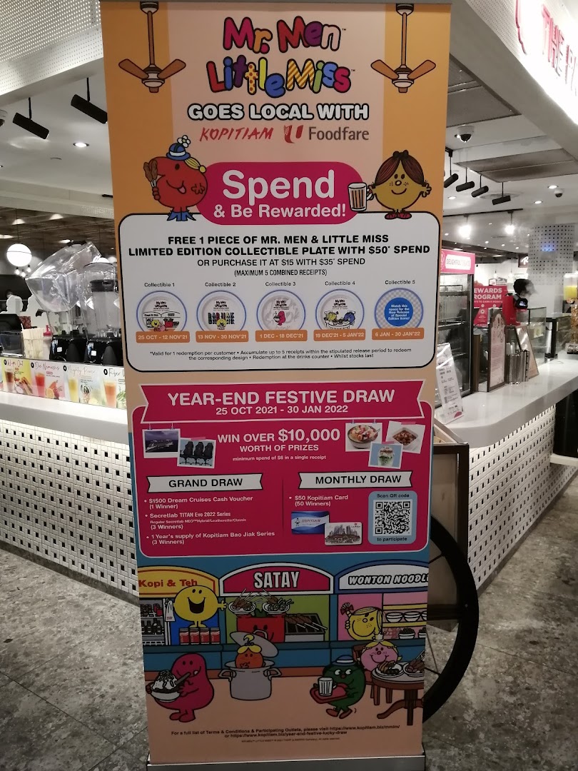 A promotional banner for Kopitiam featuring a 'Mr. Men Little Miss' collaboration and a year-end festive draw with prizes.