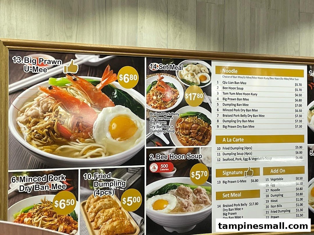 A detailed menu board displaying various noodle dishes, set meals, and add-ons with prices and images.