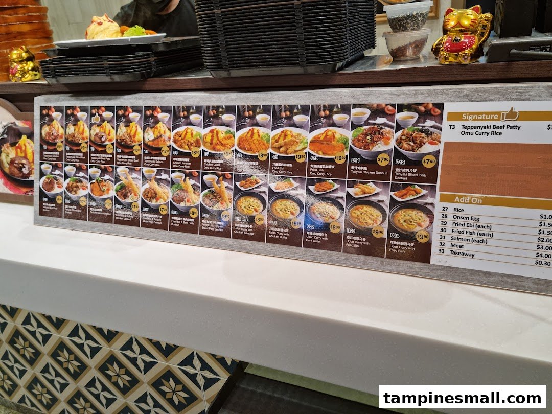 A detailed menu board showcasing various Japanese-style dishes, including omurice, donburi, and udon, with prices and add-ons.
