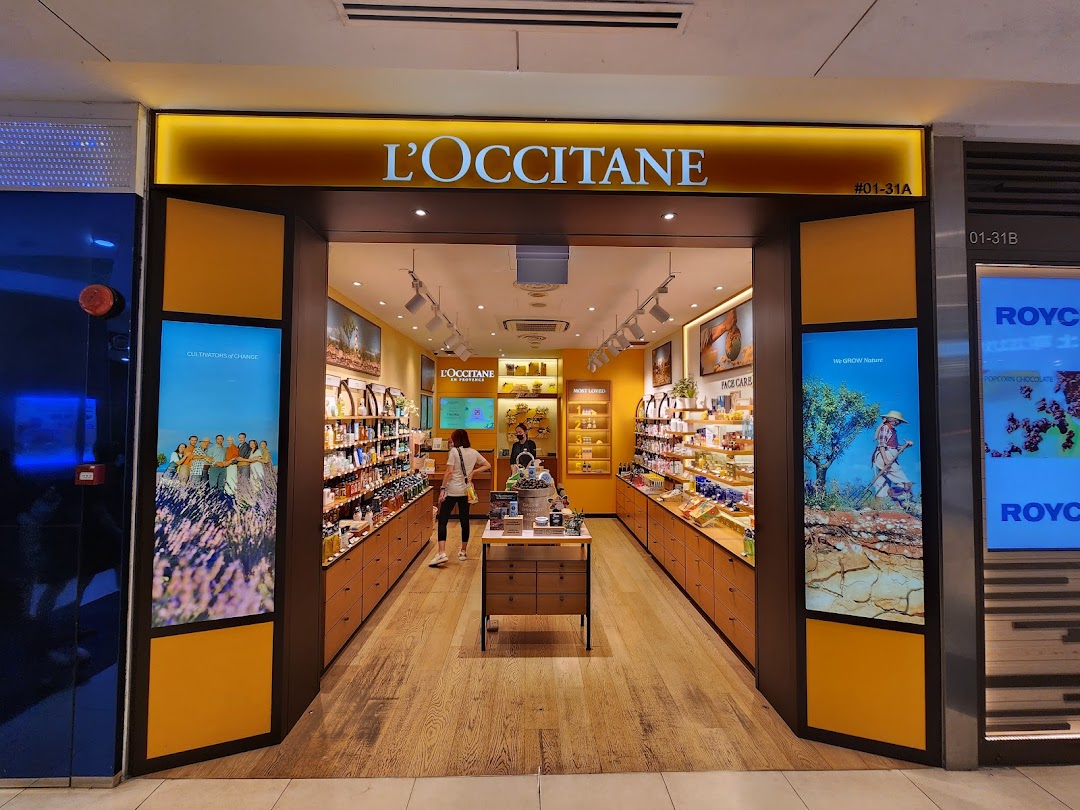 The inviting entrance of L'OCCITANE at Tampines Mall, showcasing a wide array of natural beauty products.