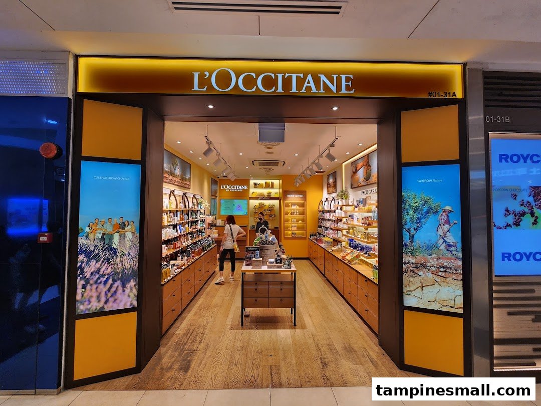 The inviting entrance of L'OCCITANE at Tampines Mall, showcasing a wide array of natural beauty products.