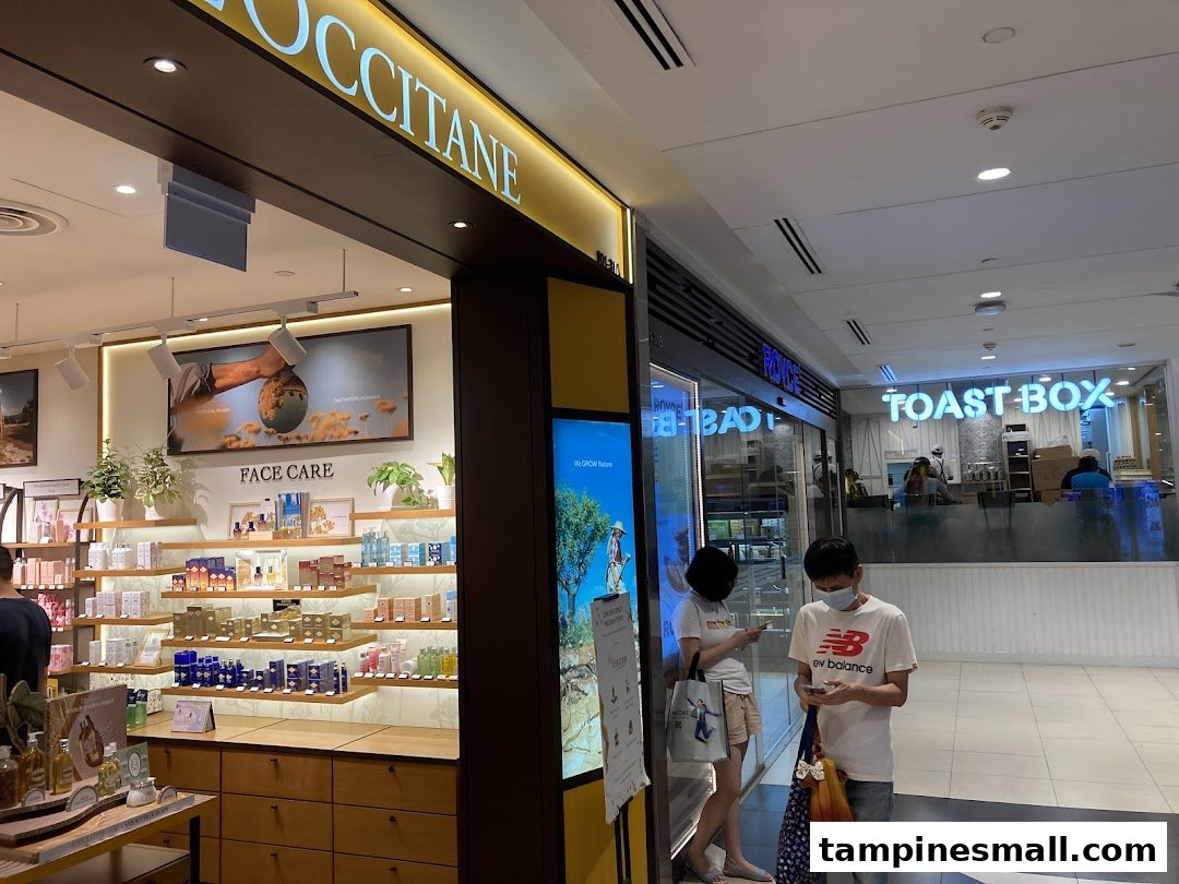 The L'OCCITANE shop entrance at Tampines Mall, showcasing its inviting interior and product displays.
