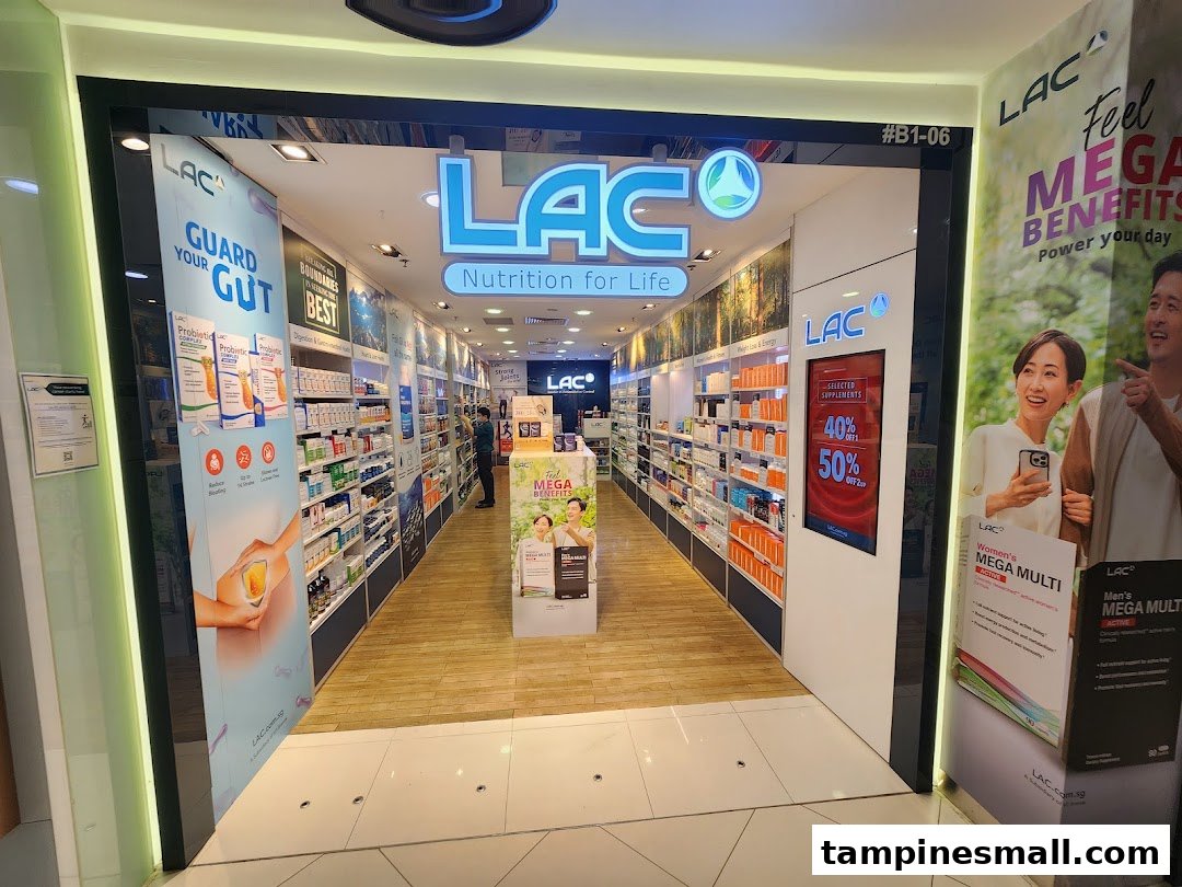 The image shows the brightly lit entrance of LAC Nutrition For Life, displaying various health supplements.