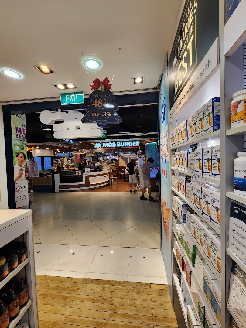 Interior view of LAC Nutrition For Life, showcasing health supplements and an exit leading to a food court.